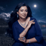 Shreya Ghoshal wearing silver jewellery as Shaya by CaratLane Brand Ambassador