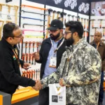 Hardware Fair India event with participants at a tools exhibition booth