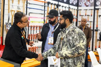 Hardware Fair India event with participants at a tools exhibition booth