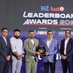 VinFast India representatives receive the EV Manufacturer of the Year award at HT Auto Leaderboard Awards 2026.