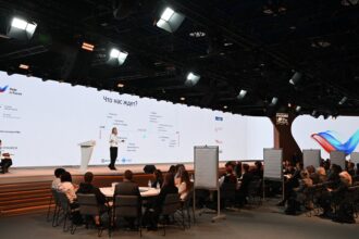 Made in Russia- Conference hall with speakers and attendees at an international business forum