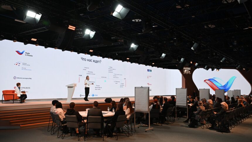 Made in Russia- Conference hall with speakers and attendees at an international business forum