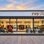 TVS Paddock premium motorcycle showroom exterior with motorcycles displayed outside
