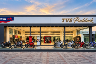 TVS Paddock premium motorcycle showroom exterior with motorcycles displayed outside