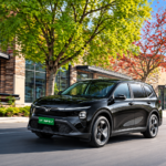 VinFast MPV 7 driving on an urban street