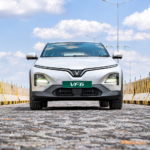Safety Features: Silver VinFast VF 6 electric SUV showcasing its safety features on a road