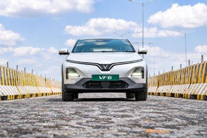 Safety Features: Silver VinFast VF 6 electric SUV showcasing its safety features on a road