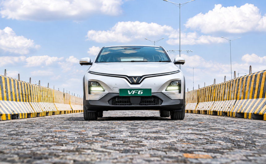 Safety Features: Silver VinFast VF 6 electric SUV showcasing its safety features on a road